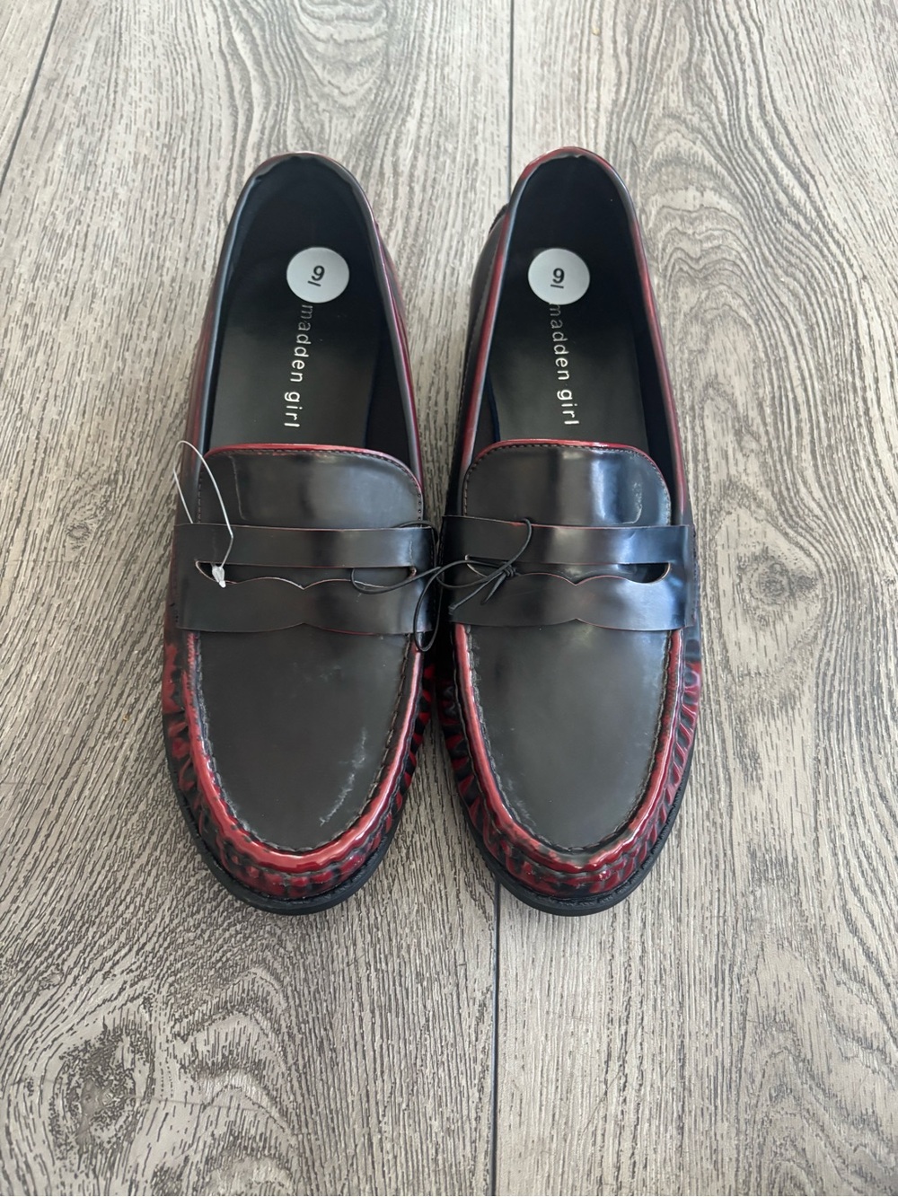 Madden Girl Black and Burgundy Slip-On Penny Loafers